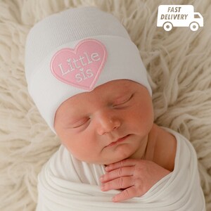 Melondipity Pink or White Newborn Girl Hospital Hat with &quot;Little Sis&quot; Pink Heart Patches | Double Ply for Extra Warmth and Comfort
