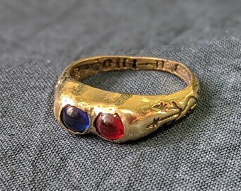 Anillo medieval con dos gemas e inscripción "Due tout mon coer" ("Con todo mi corazón"). Francia o Inglaterra, siglo XV.