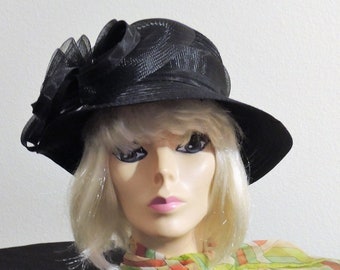 Vintage Ladies Black Hat with Tulle Hat Band and Flower by "Studio" with turned down 3" Brim.