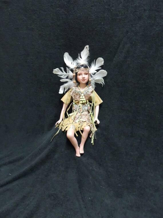 golden keepsake indian doll
