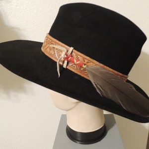 Vintage 1970&#39;s Texas 4X Beaver Cowboy Hat with custom Leather tooled Hat Band and Native Tied Goose Feather.