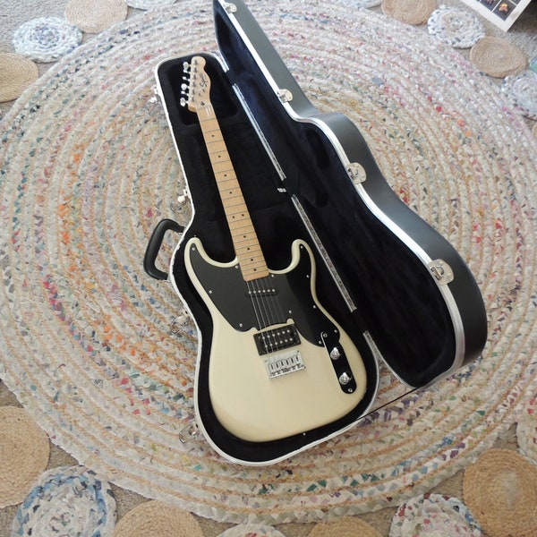 2000 blonde Fender Squier 51 with original case.