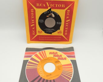 Vintage 2 Elvis Presley 45 Records.