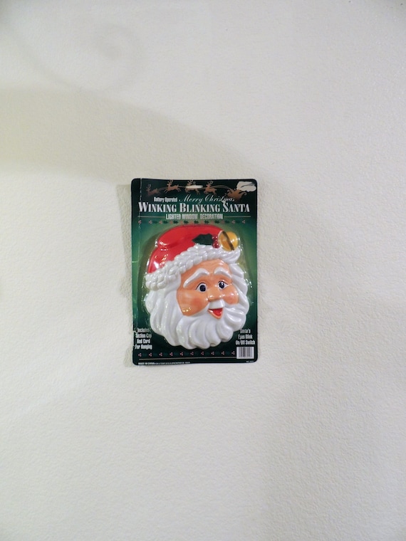Vintage Christmas Display Winking Blinking Santa Clause Lighted Window Decoration Battery operated, with Cord and Suction Cup for Hanging.