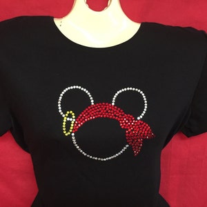 May include: Black t-shirt with a rhinestone design of Mickey Mouse wearing a red and yellow bandana.