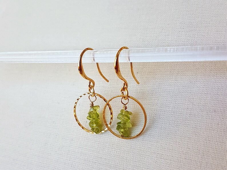 Gold plated drop earrings with sparkling gold plated hoop ring and green peridot gemstones dangle chakra earrings August birthstone