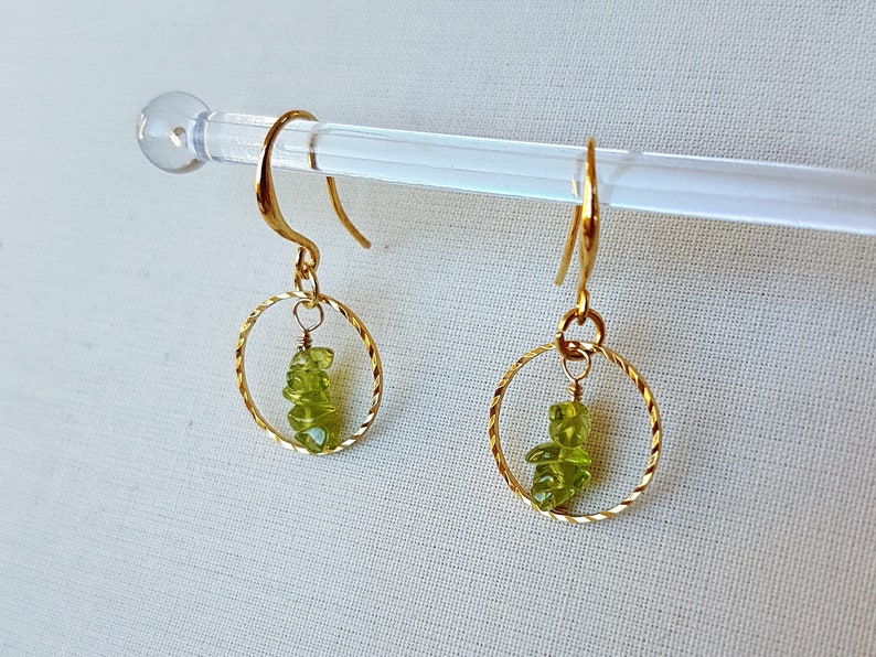 Gold plated drop earrings with sparkling gold plated hoop ring and green peridot gemstones dangle chakra earrings August birthstone