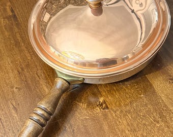 Vintage copper pan with a matching lid