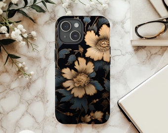 May include: A black phone case with a floral design. The flowers are gold and blue on a black background.