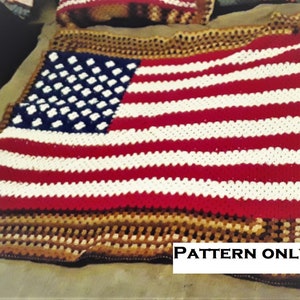 May include: Crochet pattern for an American flag blanket. The blanket is made with red, white, and blue yarn and has a brown border.