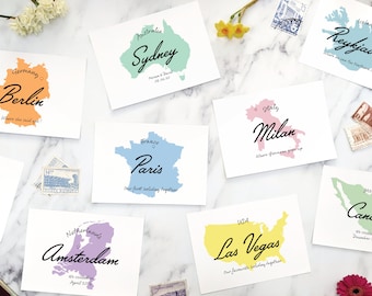 Travel theme table name cards for destination wedding