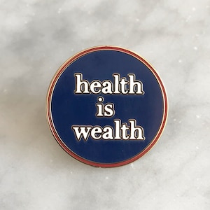 Wellness enamel pin