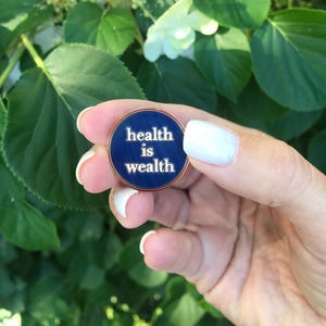 Wellness enamel pin