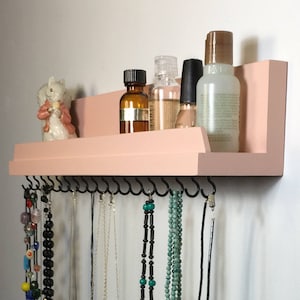Jewelry Rack with narrow ledge self for lotion and essential oils