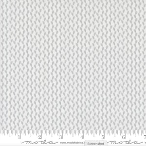 May include: White fabric with a repeating pattern of small gray leaves. The fabric has a subtle texture and a soft, light feel.