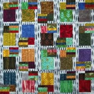 May include: A colorful patchwork quilt with squares of different fabrics and patterns. The quilt is made up of a variety of colors, including red, blue, green, yellow, and brown. The quilt is made with a variety of fabrics, including cotton, linen, and silk.