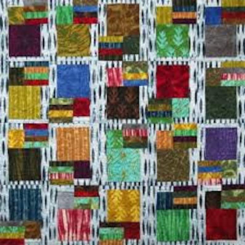 May include: A colorful patchwork quilt with squares of different fabrics and patterns. The quilt is made up of a variety of colors, including red, blue, green, yellow, and brown. The quilt is made with a variety of fabrics, including cotton, linen, and silk.