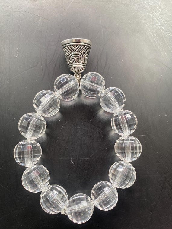 BCL6S: Clear Bracelet with Bell
