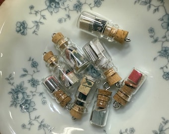 Lil’ Bottle of Books! 5 handmade books inside a mini glass bottle jewelry charm!