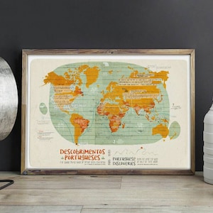 May include: A framed world map with a vintage style design. The map is coloured in shades of yellow, green, and blue. The title of the map is "Descobrimentos Portugueses" which translates to "Portuguese Discoveries".