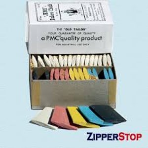May include: A box of assorted tailor's chalk in white, pink, yellow, and blue. The box is labeled "The Old Tailor" and "a PMC quality product".