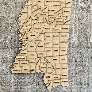 État numérique du Mississippi avec carte des comtés Fichier de puzzle SVG, PDF, DXF et EpS, gravure et découpe au laser