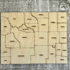 État numérique du Wyoming avec carte des comtés Fichier de puzzle SVG, PDF, DXF et EpS, gravure et découpe au laser