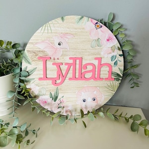 Personalised circle pink dinosaur bedroom name plaque sign door sign wall hanging boys girls nursery bedroom pink Dino nursery