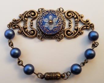 Antique Bronze bracelet with stunning Blue Czech glass crystal cab with gold accents and magnetic clasp