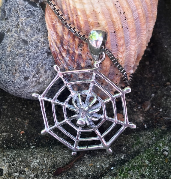 Silver necklace with spider and web pendant