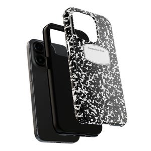 May include: A black smartphone case featuring a classic black and white speckled composition notebook pattern. The case includes a white label area with the text Composition Book printed in black. The phone is shown with a black inner frame.