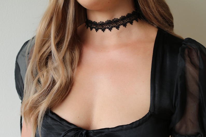 Black lace choker with silver clasp on a model - pyrado jewelry store 

black lace choker necklace