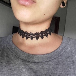 Black lace choker with silver clasp on a model - pyrado jewelry store