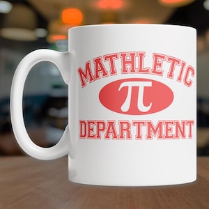 May include: White ceramic coffee mug with a red graphic that says "Mathletic Pi Department".