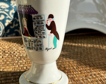 Vintage french china coffee beaker with a cartoon by Peynet to one side