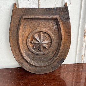 Plaque de cheminée ancienne en fonte