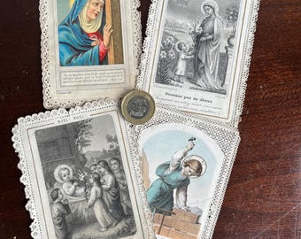 Bundle of 4 antique French religious/ prayer cards with fancy but worn perforated edges