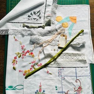 Creative box of vintage embroidery pieces