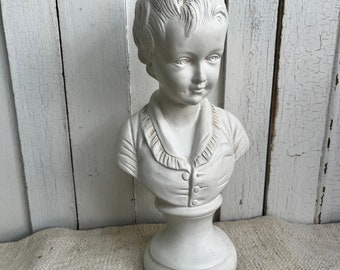 Vintage French plaster bust of a child based on a Tharaud original, some wear commensurate with age.