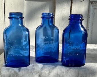 Single Vintage Milk of Magnesia cobalt blue apothecary bottle