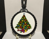 Christmas Tree with Angel on top wall plaque trivet cast iron and ceramic marked action and orient