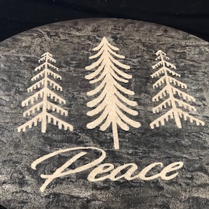 Textured Concrete Lazy Susan Featuring Hand Engraved Trees and &quot;Peace&quot;  on a Black Background 24&quot; diameter
