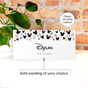 May include: A rectangular white birthday card featuring a top border of black Mickey Mouse silhouettes, colorful party hats, balloons, and gifts. The center displays the name Dylan in a stylized font above the text HAPPY BIRTHDAY.
