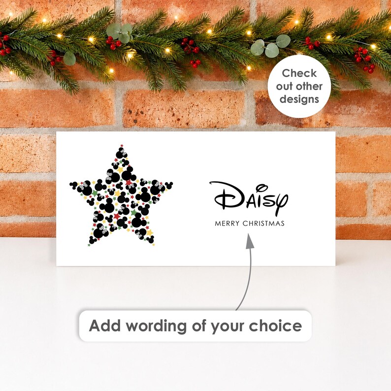 May include: A white rectangular sign featuring a star shape composed of black, red, and gold mouse-ear silhouettes. The text reads Daisy and Merry Christmas. An arrow points to a box with the text Add wording of your choice.