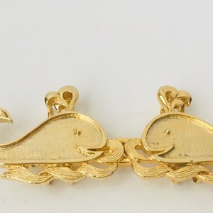Belt Buckle Pair, Gold Whale, 1981 Mimi Di N