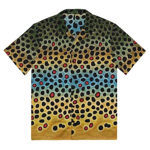May include: A short-sleeved button-up shirt with a brown trout pattern. The shirt has a black background with brown, yellow, blue, and red spots.