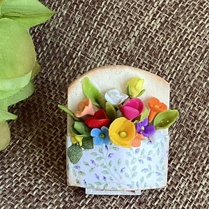 Miniature floral arrangement,