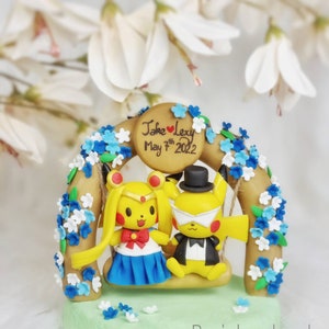 Handmade Clay Wedding Cake Topper: Pikachu Cosplay Sailor Moon & Tuxedo Mask
