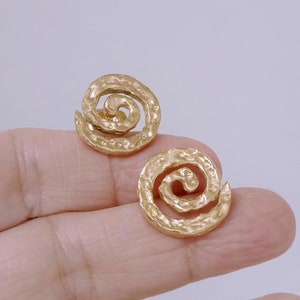 Contemporary earrings for women with a textured round spiral image 4