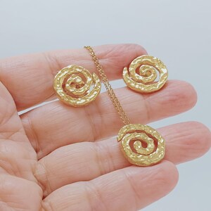 Contemporary earrings for women with a textured round spiral image 8